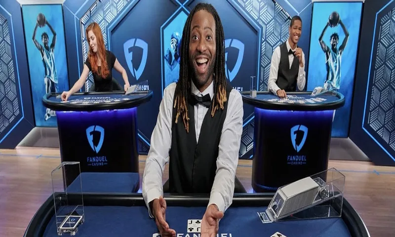 Live dealer casino poker table with community cards and chip stacks